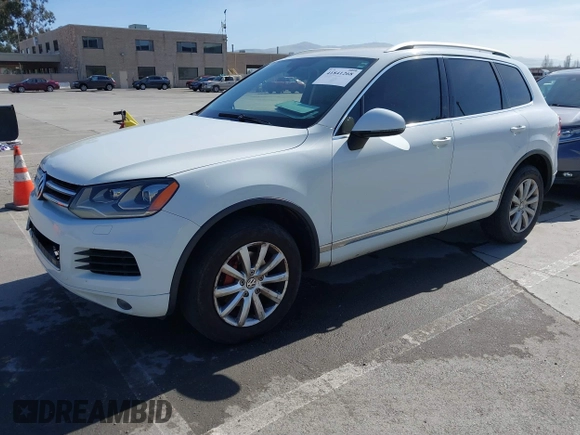 2012 Volkswagen Touareg Sport with VIN WVGEF9BP5CD007294, listed as a IAAI auction lot 41841268 with 160,883 mi miles and . Bid and sale history available at DreamBid. Image 17.
