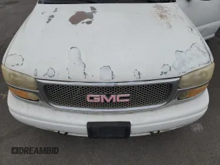 2005 GMC Yukon Denali z VIN 1GKEK63UX5J194771, wystawiony jako Copart lot #53170035 z przebiegiem 175 910 mil mil oraz Tytuł czysty. Historia ofert i sprzedaży dostępna na DreamBid. Obrazek 12.