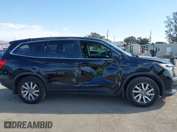 2020 Honda Pilot EX-L with VIN 5FNYF5H54LB009448, listed as a IAAI auction lot 41697106 with 63,310 mi miles. Bid and sale history available at carsss.com. Image 13.