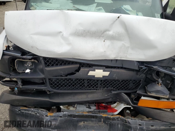 2012 Chevrolet Express Cargo z VIN 1GCWGFCA1C1169004, wystawiony jako Copart lot #71554104 z przebiegiem Nie podano mil oraz Szkoda całkowita • Salvage title. Historia ofert i sprzedaży dostępna na DreamBid. Obrazek 13.