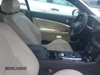 2012 Jaguar XK with VIN SAJWA4FB8CLB47049, listed as a IAAI auction lot 42118136 with 60,953 mi miles. Bid and sale history available at carsss.com. Image 5.