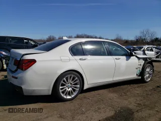 2014 BMW 7 Series 740Li xDrive with VIN WBAYF4C50ED281830, listed as a Copart auction lot 48557035 with 129,497 mi miles and Salvage Title. Bid and sale history available at carsss.com. Image 3.