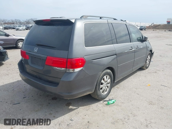 2010 Honda Odyssey EX-L with VIN 5FNRL3H61AB013500, listed as a IAAI auction lot 41724860 with 139,566 mi miles. Bid and sale history available at carsss.com. Image 4.