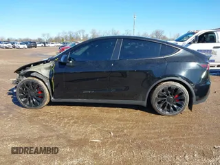 2022 Tesla Model Y Performance with VIN 7SAYGDEFXNF313636, listed as a IAAI auction lot 41660019 with 30,258 mi miles and . Bid and sale history available at DreamBid. Image 15.
