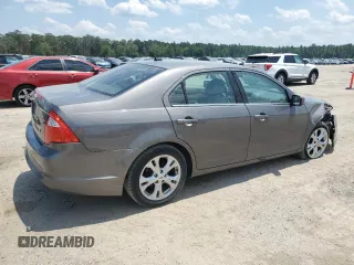 2012 Ford Fusion SE z VIN 3FAHP0HA0CR328833, wystawiony jako Copart lot #57631955 z przebiegiem 94 613 mil mil oraz Szkoda całkowita • Salvage title. Historia ofert i sprzedaży dostępna na DreamBid. Obrazek 3.