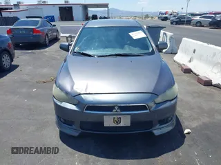 2010 Mitsubishi Lancer GTS z VIN JA32X8HW6AU005689, wystawiony jako IAAI lot #42467923 z przebiegiem 166 508 mil mil oraz . Historia ofert i sprzedaży dostępna na DreamBid. Obrazek 6.