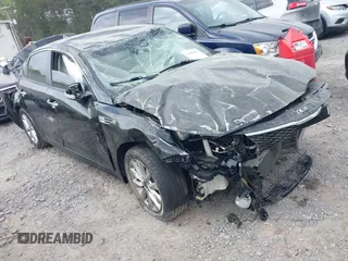 2018 Kia Optima LX z VIN 5XXGT4L33JG267863, wystawiony jako IAAI lot #41948493 z przebiegiem 71 123 mil mil oraz . Historia ofert i sprzedaży dostępna na DreamBid. Obrazek 1.