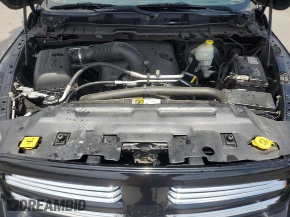 2014 Ram 1500 z VIN 3C6JR7CT3EG267944, wystawiony jako Copart lot #58227375 z przebiegiem 134 917 mil mil oraz Szkoda całkowita • Salvage title. Historia ofert i sprzedaży dostępna na DreamBid. Obrazek 11.