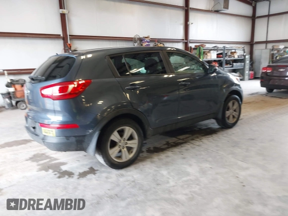 2012 Kia Sportage LX z VIN KNDPBCA23C7217340, wystawiony jako IAAI lot #42299191 z przebiegiem 150 577 mil mil oraz . Historia ofert i sprzedaży dostępna na DreamBid. Obrazek 4.