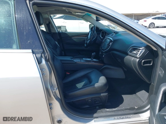 2014 Maserati Ghibli S Q4 with VIN ZAM57RTA8E1085631, listed as a IAAI auction lot 41829745 with 80,418 mi miles. Bid and sale history available at carsss.com. Image 5.