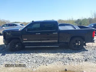 2015 GMC Sierra 1500 SLT with VIN 3GTU2VEJ8FG318480, listed as a IAAI auction lot 42075388 with 143,156 mi miles and . Bid and sale history available at DreamBid. Image 14.