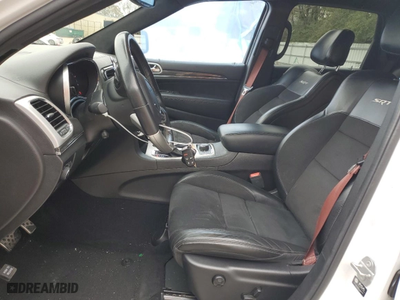 2021 Jeep Grand Cherokee SRT with VIN 1C4RJFDJ1MC561144, listed as a Copart auction lot 83961214 with 49,989 mi miles and Salvage Title. Bid and sale history available at carsss.com. Image 7.