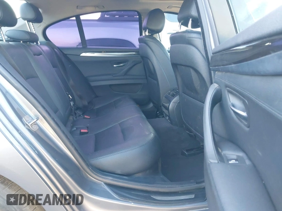 2014 BMW 5 Series 535i with VIN WBA5B1C54ED479873, listed as a IAAI auction lot 41338061 with 75,097 mi miles and . Bid and sale history available at DreamBid. Image 8.
