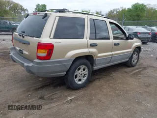 2000 Jeep Grand Cherokee Laredo with VIN 1J4GW48SXYC100248, listed as a IAAI auction lot 42182318 with 227,658 mi miles and . Bid and sale history available at DreamBid. Image 4.
