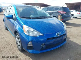 2013 Toyota Prius c One with VIN JTDKDTB39D1039272, listed as a IAAI auction lot 41599306 with 102,382 mi miles. Bid and sale history available at carsss.com. Image 6.