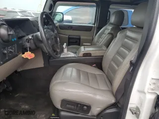 2005 Hummer H2 SUV with VIN 5GRGN23UX5H116341, listed as a Copart auction lot 76877704 with 145,778 mi miles and Salvage Title. Bid and sale history available at carsss.com. Image 7.