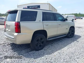2015 Chevrolet Tahoe LT z VIN 1GNSCBKC7FR140125, wystawiony jako IAAI lot #42279760 z przebiegiem 201 335 mil mil oraz . Historia ofert i sprzedaży dostępna na DreamBid. Obrazek 4.