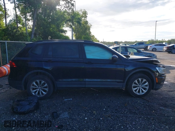 2020 Volkswagen Tiguan S z VIN 3VV1B7AX7LM133084, wystawiony jako IAAI lot #42597631 z przebiegiem 84 415 mil mil oraz . Historia ofert i sprzedaży dostępna na DreamBid. Obrazek 13.