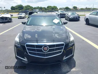 2014 Cadillac CTS RWD with VIN 1G6AP5SX0E0185913, listed as a IAAI auction lot 42685622 with 107,406 mi miles and . Bid and sale history available at DreamBid. Image 12.