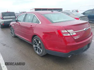 2014 Ford Taurus SEL z VIN 1FAHP2E83EG125622, wystawiony jako IAAI lot #42204238 z przebiegiem 134 032 mil mil oraz . Historia ofert i sprzedaży dostępna na DreamBid. Obrazek 3.