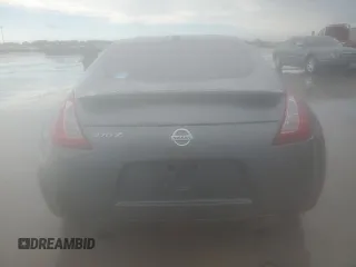 2015 Nissan 370Z Nismo z VIN JN1AZ4EH0FM444256, wystawiony jako Copart lot #54620065 z przebiegiem 78 626 mil mil oraz Szkoda całkowita • Salvage title. Historia ofert i sprzedaży dostępna na DreamBid. Obrazek 6.