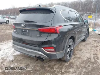 2020 Hyundai Santa Fe Limited with VIN 5NMS5CAA3LH250453, listed as a IAAI auction lot 41346692 with 87,876 mi miles. Bid and sale history available at carsss.com. Image 4.