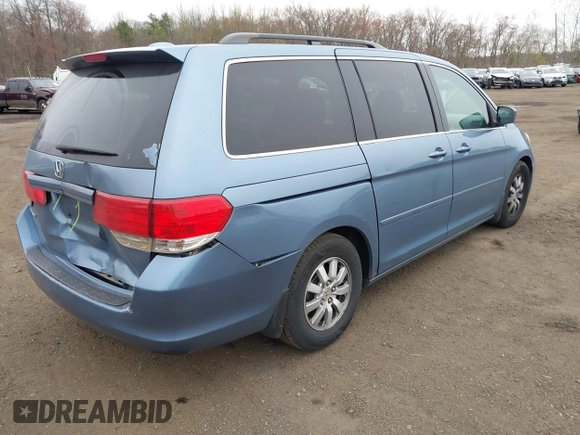 2010 Honda Odyssey EX-L with VIN 5FNRL3H79AB088793, listed as a IAAI auction lot 42008558 with 282,980 mi miles. Bid and sale history available at carsss.com. Image 4.