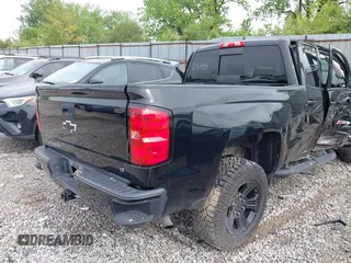 2016 Chevrolet Silverado 1500 LT with VIN 1GCVKREC2GZ323737, listed as a IAAI auction lot 42176512 with 95,385 mi miles and . Bid and sale history available at DreamBid. Image 4.
