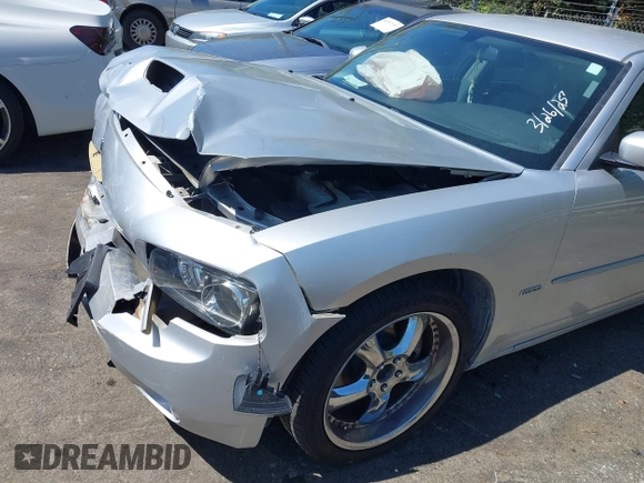 2006 Dodge Charger R/T with VIN 2B3KA53H56H513111, listed as a IAAI auction lot 41977236 with 173,048 mi miles and . Bid and sale history available at carsss.com. Image 13.