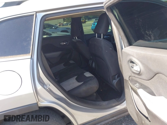 2014 Jeep Cherokee Latitude with VIN 1C4PJLCS6EW103423, listed as a IAAI auction lot 40118289 with 112,120 mi miles and . Bid and sale history available at DreamBid. Image 8.