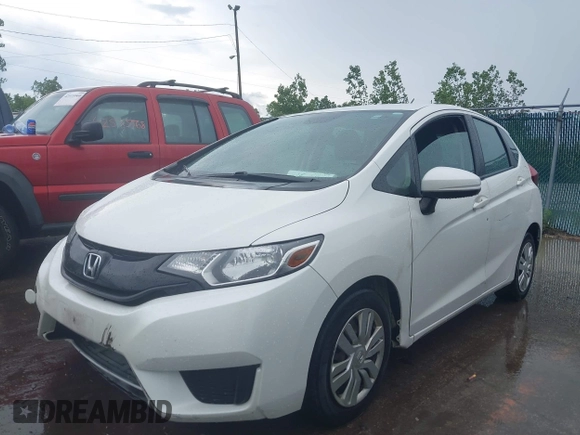 2015 Honda Fit LX with VIN 3HGGK5H52FM775462, listed as a IAAI auction lot 42549634 with 167,391 mi miles and . Bid and sale history available at DreamBid. Image 2.