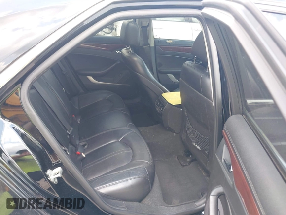 2011 Cadillac CTS Luxury with VIN 1G6DF5EY8B0100736, listed as a IAAI auction lot 42581059 with 107,237 mi miles and . Bid and sale history available at DreamBid. Image 8.