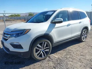 2018 Honda Pilot Touring z VIN 5FNYF6H98JB032821, wystawiony jako IAAI lot #41012077 z przebiegiem 110 321 mil mil oraz . Historia ofert i sprzedaży dostępna na DreamBid. Obrazek 17.
