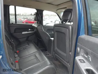 2010 Jeep Liberty Limited with VIN 1J4PN5GK9AW169883, listed as a IAAI auction lot 41887416 with 141,943 mi miles. Bid and sale history available at carsss.com. Image 8.