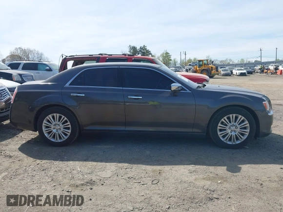 2013 Chrysler 300 C with VIN 2C3CCAKT2DH567348, listed as a IAAI auction lot 41909284 with 110,710 mi miles and . Bid and sale history available at DreamBid. Image 13.