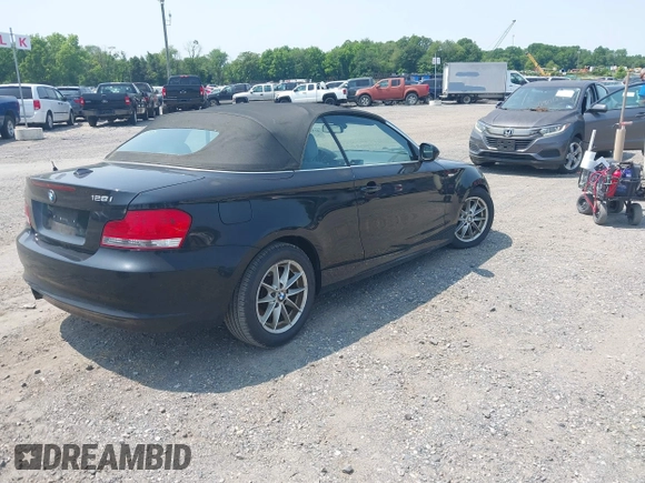2010 BMW 1 Series 128i with VIN WBAUN1C55AVH81750, listed as a IAAI auction lot 42411484 with 124,432 mi miles and . Bid and sale history available at DreamBid. Image 4.
