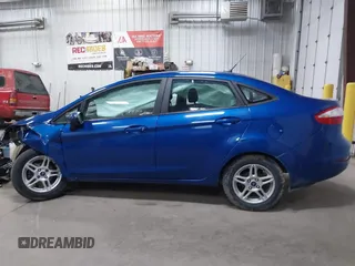 2019 Ford Fiesta SE z VIN 3FADP4BJXKM118427, wystawiony jako IAAI lot #41643927 z przebiegiem 109 617 mil mil oraz . Historia ofert i sprzedaży dostępna na DreamBid. Obrazek 13.