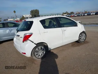 2013 Toyota Yaris L with VIN JTDKTUD35DD571249, listed as a IAAI auction lot 41589605 with Not Provided miles. Bid and sale history available at carsss.com. Image 4.