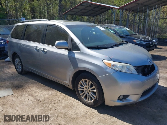 2015 Toyota Sienna XLE with VIN 5TDYK3DC0FS558486, listed as a IAAI auction lot 42064281 with 211,119 mi miles and . Bid and sale history available at DreamBid. Image 1.