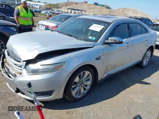 2013 Ford Taurus Limited with VIN 1FAHP2F83DG231176, listed as a IAAI auction lot 42776538 with 220,580 mi miles and . Bid and sale history available at DreamBid. Image 2.