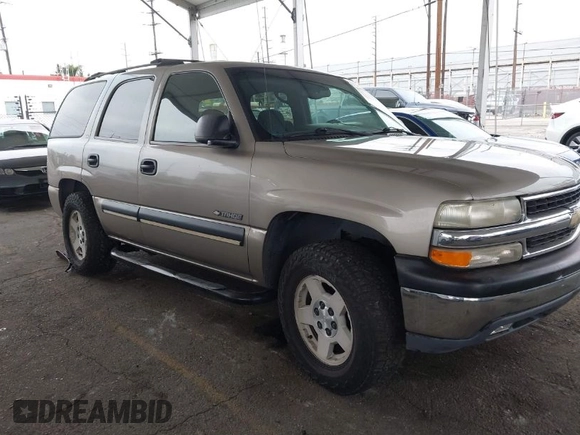 2002 Chevrolet Tahoe LS with VIN 1GNEC13T62R311933, listed as a IAAI auction lot 41895509 with 236,603 mi miles and . Bid and sale history available at DreamBid. Image 1.
