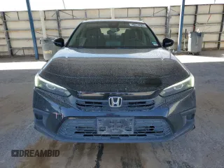 2023 Honda Civic Sedan EX with VIN 2HGFE1F72PH310289, listed as a Copart auction lot 49310585 with 58,828 mi miles and Salvage Title. Bid and sale history available at carsss.com. Image 5.