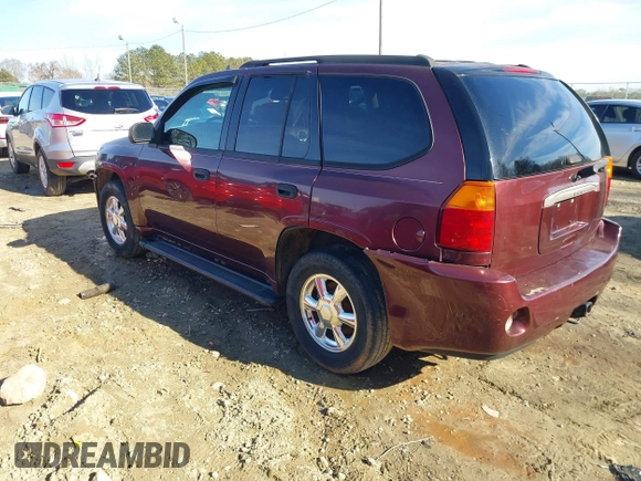 2007 GMC Envoy SLE with VIN 1GKDS13S472201367, listed as a IAAI auction lot 41327646 with 232,019 mi miles. Bid and sale history available at carsss.com. Image 3.