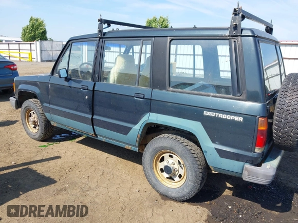 1990 Isuzu Trooper z VIN JACCH58EXL7903060, wystawiony jako IAAI lot #42516100 z przebiegiem 189 700 mil mil oraz . Historia ofert i sprzedaży dostępna na DreamBid. Obrazek 3.