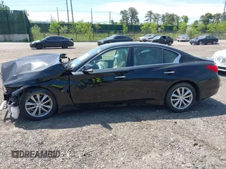 2015 Infiniti Q50 Premium z VIN JN1BV7AR4FM410949, wystawiony jako IAAI lot #42243917 z przebiegiem 56 552 mil mil oraz . Historia ofert i sprzedaży dostępna na DreamBid. Obrazek 14.