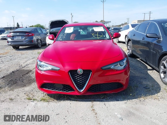 2020 Alfa Romeo Giulia with VIN ZARFAMAN1L7636002, listed as a IAAI auction lot 42121135 with 55,510 mi miles. Bid and sale history available at carsss.com. Image 13.