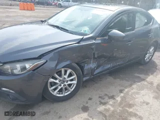 2016 Mazda Mazda3 i Touring with VIN JM1BM1V70G1313854, listed as a IAAI auction lot 41957601 with 144,128 mi miles. Bid and sale history available at carsss.com. Image 6.