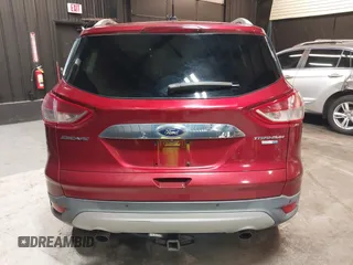 2014 Ford Escape Titanium with VIN 1FMCU9J9XEUD69589, listed as a IAAI auction lot 42031882 with 123,632 mi miles and . Bid and sale history available at DreamBid. Image 16.