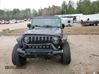 2021 Jeep Wrangler Unlimited Rubicon with VIN 1C4JJXFM0MW627692, listed as a Copart auction lot 43525105 with 102,472 mi miles and Salvage Title. Bid and sale history available at carsss.com. Image 12.