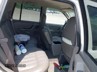 2003 Jeep Grand Cherokee Laredo with VIN 1J4GW48S73C605561, listed as a IAAI auction lot 42424407 with Not provided miles and . Bid and sale history available at DreamBid. Image 8.